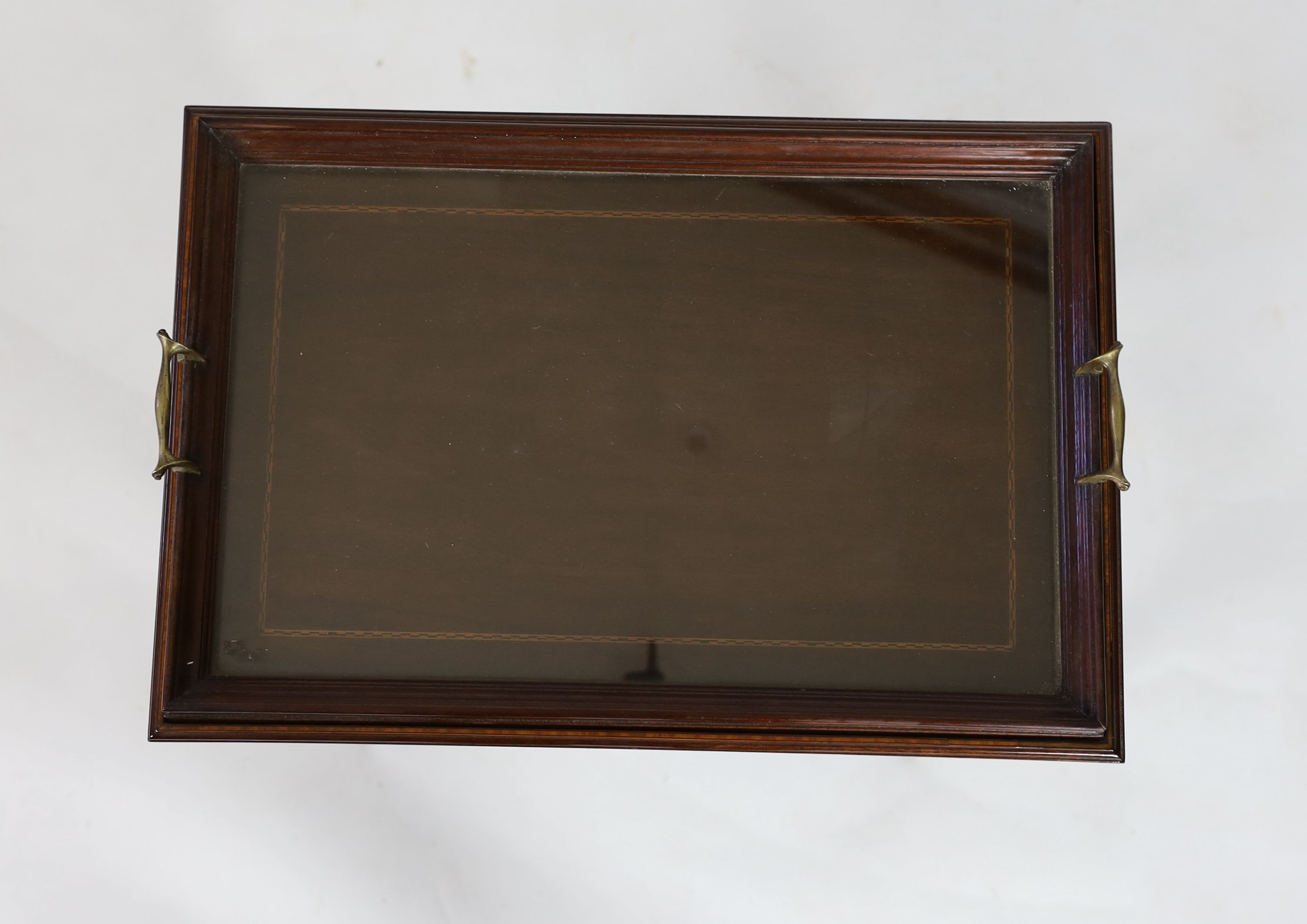 An Edwardian inlaid mahogany tray topped table, with drop flap undertier, width 56cm depth 36cm height 79cm